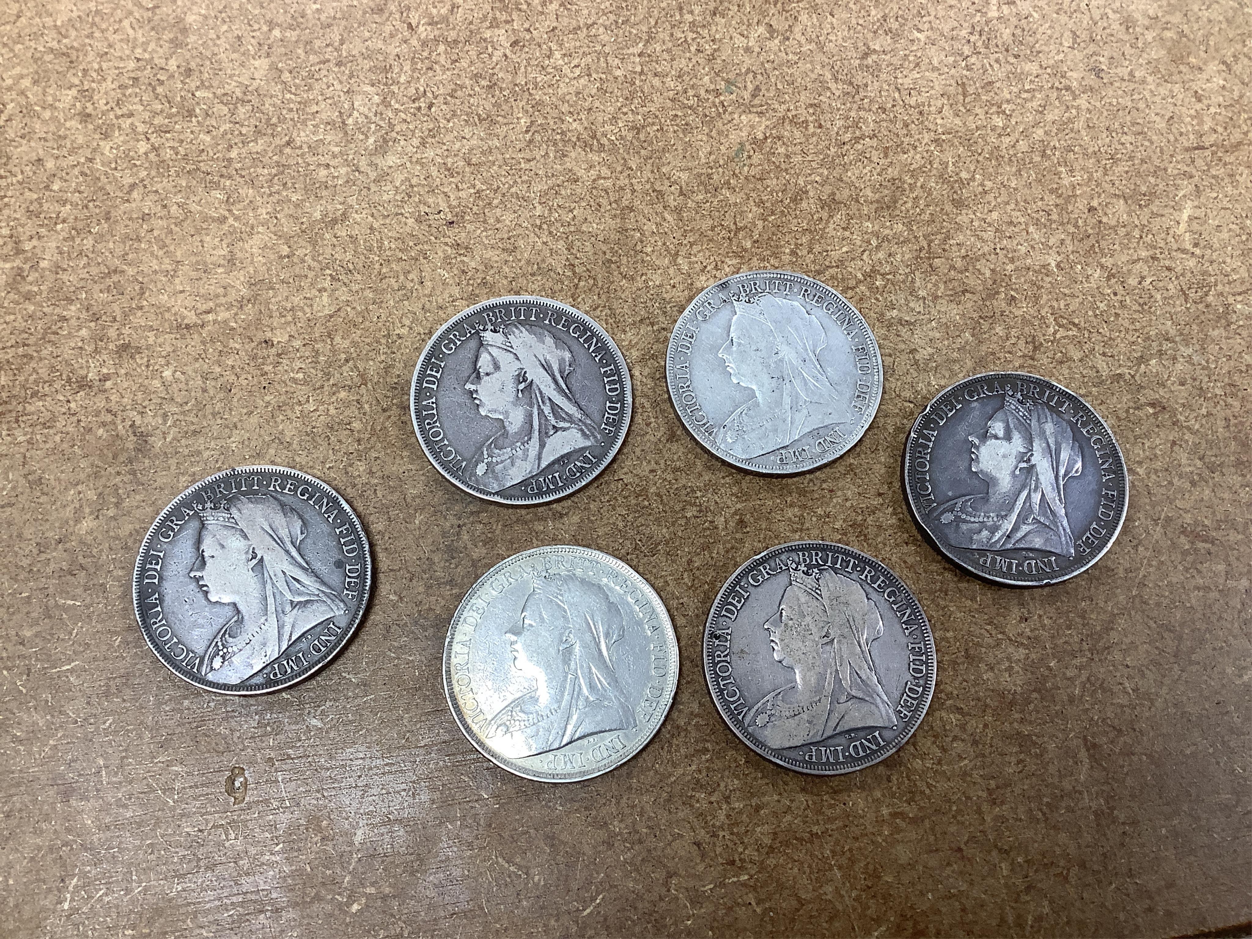 British silver coins, Victoria to George VI, eighteen crowns;, two 1889, 1890, 1891, 1892, two 1893, 1894 to 1895, 1896, 1897, 1898, four 1935 and 1937, ranging from fine to about EF